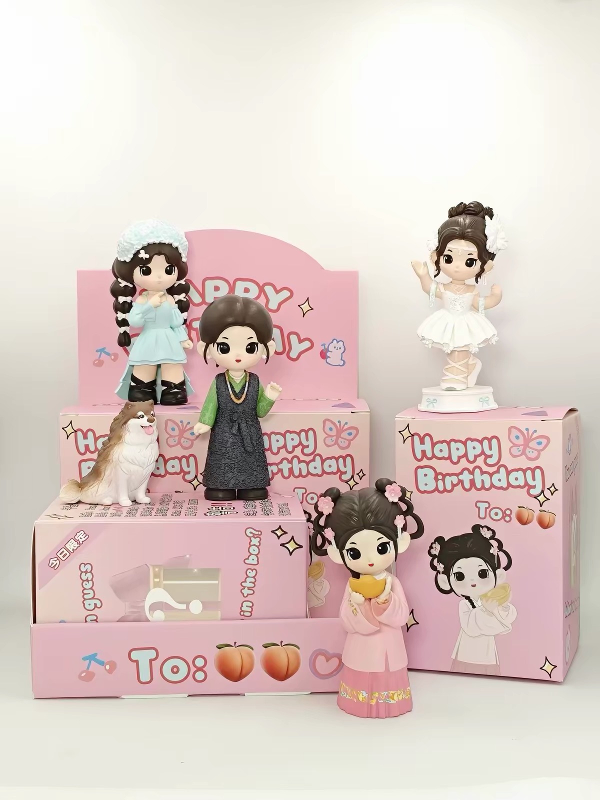 Collection of custom figures and presentation boxes