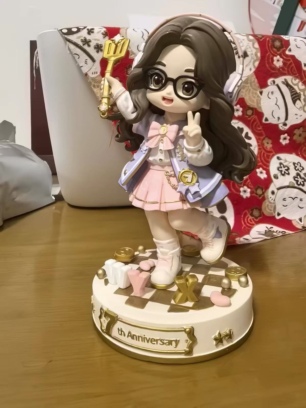 Detailed anniversary figure on a decorated display base